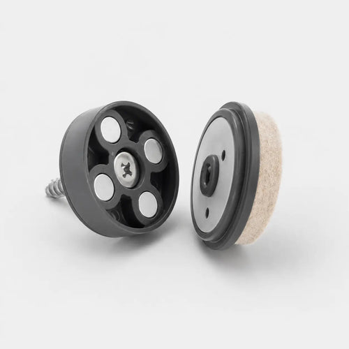 MagniGlide permanent screw-mounted base separated from the replaceable floor-contact glide piece with high-density virgin wool felt